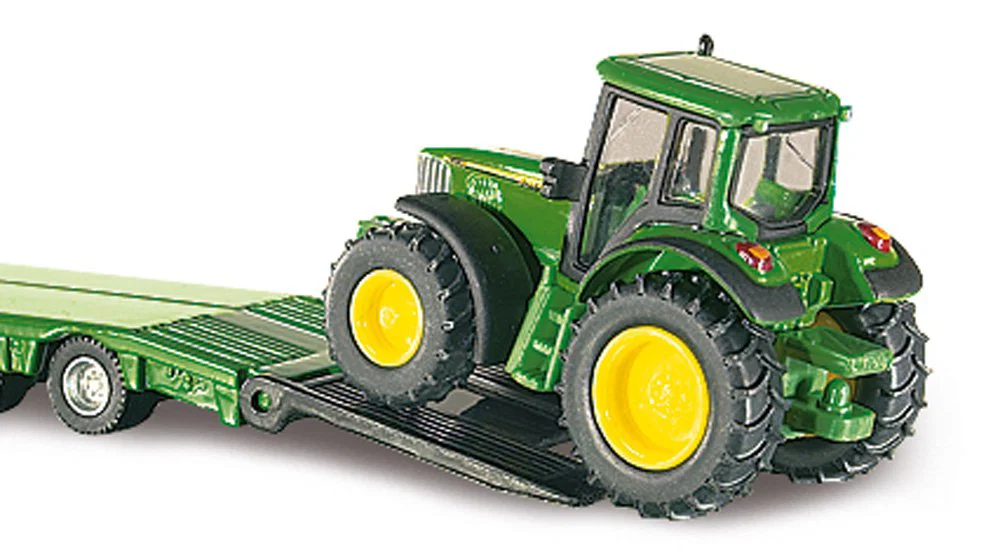 Freightliner Coronado mit zwei John Deere Traktoren – Bild 2