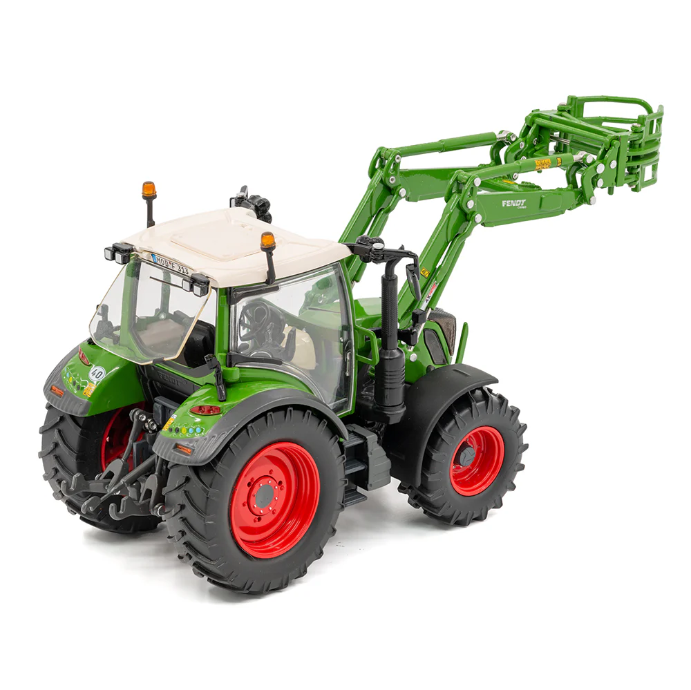 Fendt 313 Vario FL mit Ballengreifzange – Bild 3